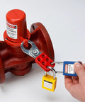 Beefy Steel Lockout Hasps With Vinyl Coated Handle For Multiple Padlocks securing a red valve with locks attached
