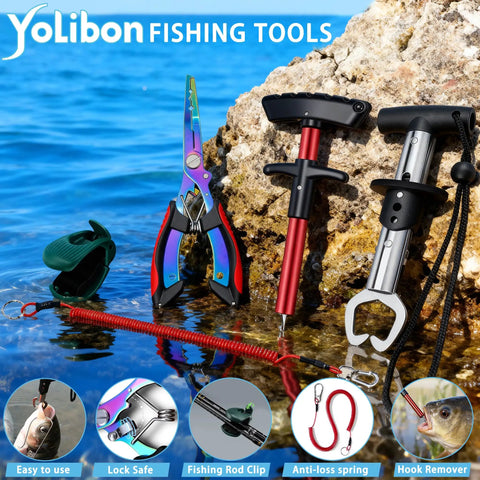 Colorful fishing tools set with pliers, rod clip, and fish gripper by rocky shoreline and clear water.