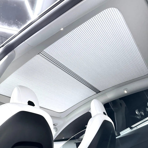 Fully Retractable Aluminum Sunroof Sunshade For Tesla Model Y Heavy Duty Heat Blocker with smooth sliding panels in white interior.