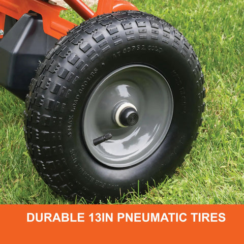 Close-up of 13-inch pneumatic tire on Big Yard Workhorse 130 Lb Walk Behind Lawn And Garden Broadcast Spreader For Seed Fertilizer Salt Ice Melt