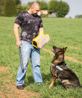 Trainer holding Durable Dog Bite Sleeve For Medium To Large Breeds Pro Training Gear For German Shepherds And Pitbulls.