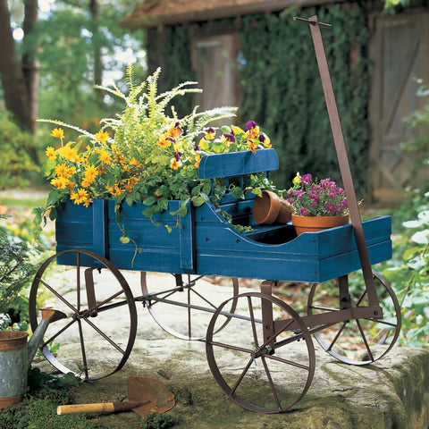 Amish Wagon Garden Planter On Wheels for Indoor Outdoor Decor Blue with flowers, rustic wooden cart on metal wheels in garden setting