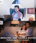 People using Alexa Compatible Color Changing Smart Bulbs showing bright and dim tunable lights in a living room setting.