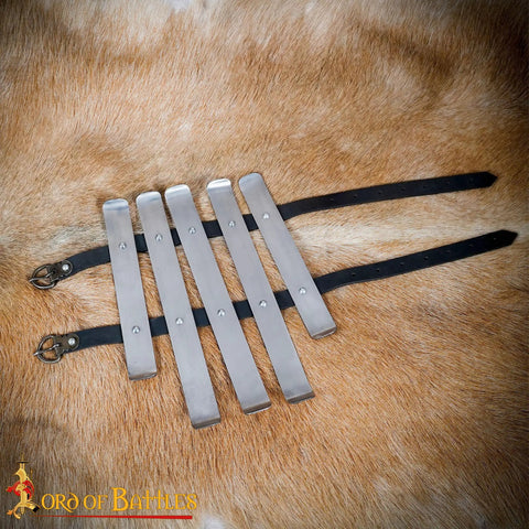Medieval Bracers For Cosplay And Reenactments, Fully Functional Arm Guards With Splinted Steel displayed on a fur background