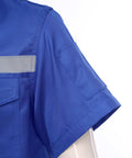 Men's Rugged As Nails Short Sleeve Work Jacket With Reflective Safety Stripes Heavy Duty Industrial Mechanic Uniform Zip Front Turn Down Collar Day Shift Shop Gear Blue 4XL showing blue fabric and shoulder with reflective stripe.