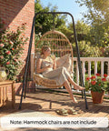 Woman relaxing on Heavy Duty Free Standing Hammock Chair Stand With Anti Slip Foot Pads And Two Carabiners for indoor outdoor use