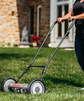 18 Inch 5 Blade Push Reel Lawn Mower With Adjustable Cutting Height 0.5 To 2.75 Inches, Ball Bearing Blades, in use on a lawn