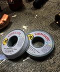 Liontape G701 Heavy Duty PTFE Teflon Pipe Thread Sealant Tape Half Inch By Twelve Hundred Inches 4 Mil Thick 100 Ft Leak Proof Water Oil Gas Up To 12000 PSI Grey rolls on gray surface