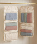 Game Changer 2 Pack Mesh Hanging Closet Storage Organizers Beige Foldable Bra And Sock Storage Pockets Anti Tangle Wardrobe Bags hanging with organized items.