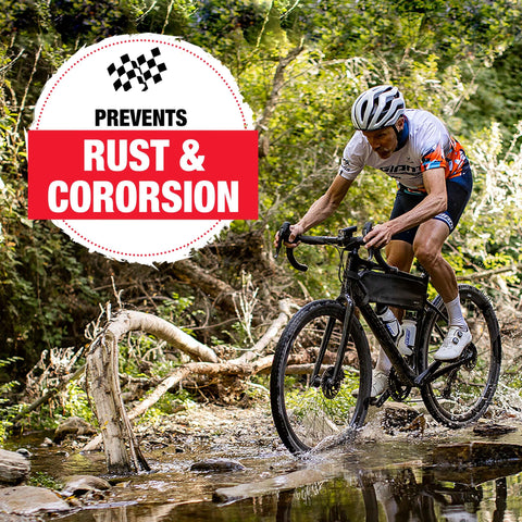 Cyclist riding through a forest with a focus on Ceramic Bike Grease For Bottom Brackets, Hubs, And Headsets preventing rust and corrosion.