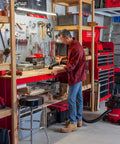 Person using All Purpose Wet Dry Vac Attachment Kit For Home And Shop Use, Industrial Grade Vacuum Accessories For Two And A Half Inch Hoses in garage