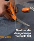 Orange Handle Stainless Steel Scissors For All Purpose Cutting Ergonomic Design Sharp Blades in use on fabric