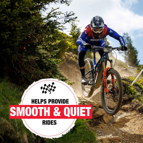 Cyclist riding downhill with Max Suspension Spray For Bicycles A Premium Lubricant For Forks And Shocks That Revives Old Suspension