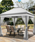 Easy Up 11x11 Pop Up Gazebo Shelter With 4 Sandbags, gray canopy tent with mesh netting and ventilated sides on a wooden deck