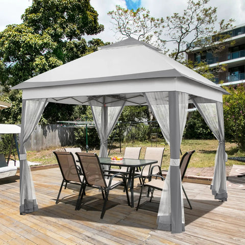 Easy Up 11x11 Pop Up Gazebo Shelter With 4 Sandbags, gray canopy tent with mesh netting and ventilated sides on a wooden deck