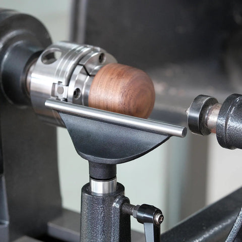 Top Shelf Heavy Duty Wood Lathe Tool Rest With Six Inch Hardened Steel Bearing Bar and Four Inch Mounting Post in use on lathe.