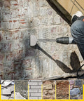 Side view of a gray steel SDS tile removal chisel bit mounted in a hammer drill chiseling a masonry wall.