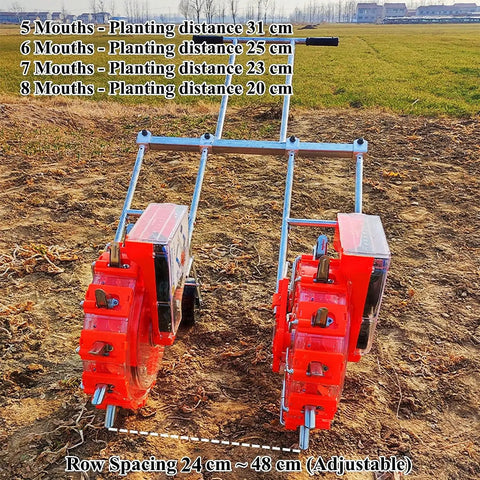 Double Row Hand Push Garden Seeder Roller Seeding And Fertilizer Applicator Manual Seeder Row Planter in field setting