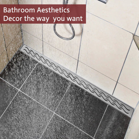 24 Inch Linear Shower Drain In Brushed Nickel Boasts A Hella Fast Deep Slope Design And Dead Simple Cleaning For Your Slick Bathroom Kitchen Or Garage Floor Trench Setup in a shower with water flowing.