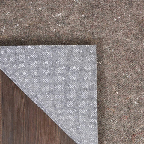 Non Slip Rug Pad Basic Grey Cushioned Underlay Keeps Rugs From Slipping, Wrinkling, And Floor Scratches, corner view on hardwood