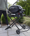 Portable Folding Grill Cart With All Terrain Wheels For On The Go Grillin Heavy Duty Strap Keeps Your Grill Secured outdoor setup