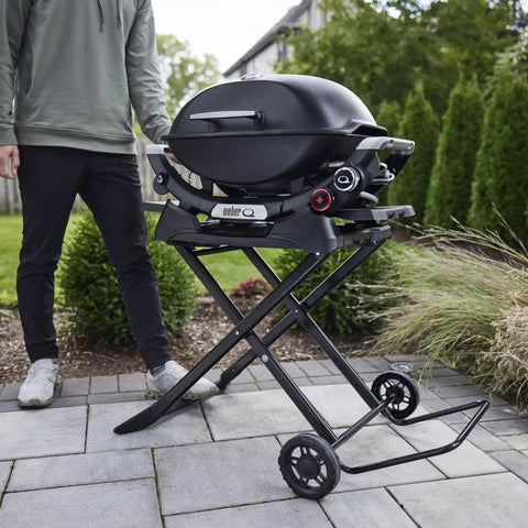 Portable Folding Grill Cart With All Terrain Wheels For On The Go Grillin Heavy Duty Strap Keeps Your Grill Secured outdoor setup