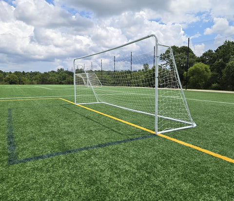 Side view of a regulation size 24 by 8 soccer goal with steel frame, heavy duty portable pro grade practice net included, 24 by 8 ft.
