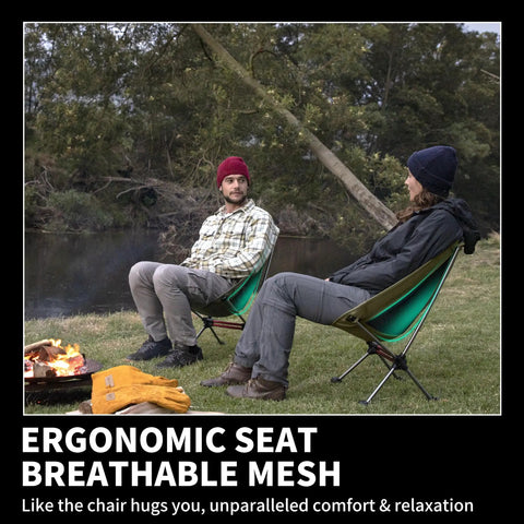 Two people sitting in Ultralight Camping Chair For Backpacking With Anti Sink Feet near a campfire, showcasing ergonomic seat.