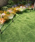 Flexible Sprinkler System For Lawn And Garden With Multi Adjustable Sprinklers, showing sprinklers watering a garden area.