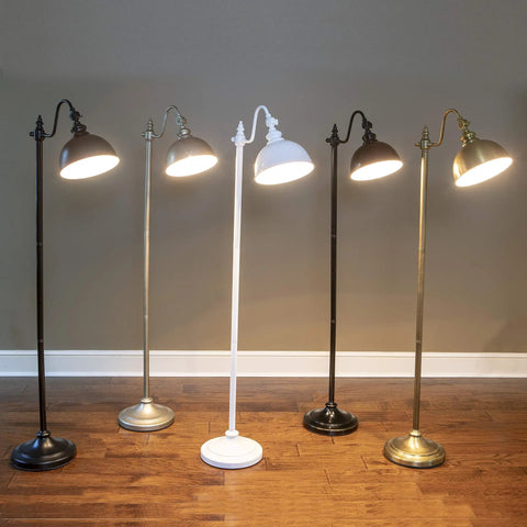 Sweet Matte Black Steel Pharmacy Floor Lamp Featuring Matching Metal Shade And Easy Rotary Switch Ideal For Brightening Up Your Living Room Office Or Cozy Reading Nook With Vintage Meets Modern Vibes displayed with other colored lamps on wooden floor.