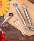 Spiral Veggie Cutter Set With Stainless Steel Spiralizer, V-Shaped Carving Tool, Fruit Baller And Two Forks on wood board