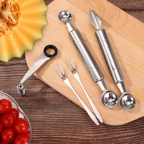 Spiral Veggie Cutter Set With Stainless Steel Spiralizer, V-Shaped Carving Tool, Fruit Baller And Two Forks on wood board