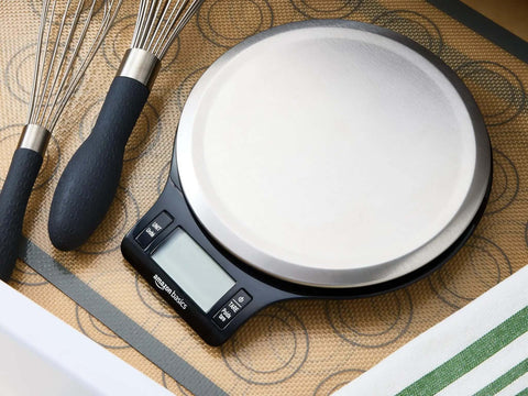 Top view of Digital Kitchen Scale With Large LCD Display And Tare Function Pro-Grade Measures In Pounds Ounces Grams Milliliters Stainless Steel