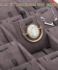 Top Tier Wooden Jewelry Organizer Tray With Plush Velvet Grids And Quick Swap Dividers For Earrings Necklaces And Pendants Keep Your Stash Sorted In This Slick Drawer Display Setup Gray with necklaces displayed in velvet slots.
