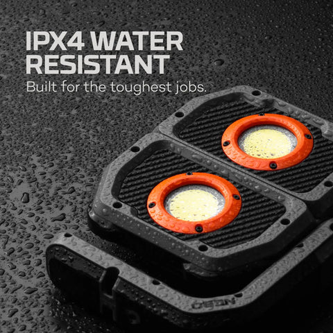 Close-up of Omni 3K Rechargeable Work Light With 3000 Lumens showing IPX4 water resistance on wet surface.