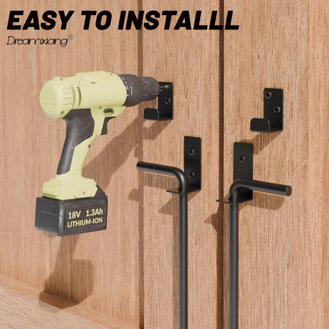 Installation of 12 Inch Heavy Duty Cane Bolt Gate Drop Rod Set on wood fence with power drill, includes extra thick ground latch, black solid steel.
