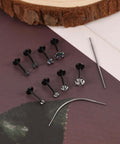 Black Threadless Nose Stud Set 18G And 20G Hypoallergenic Nostrial Tragus Lip Medusa Cartilage Helix Conch Piercing Jewelry on display