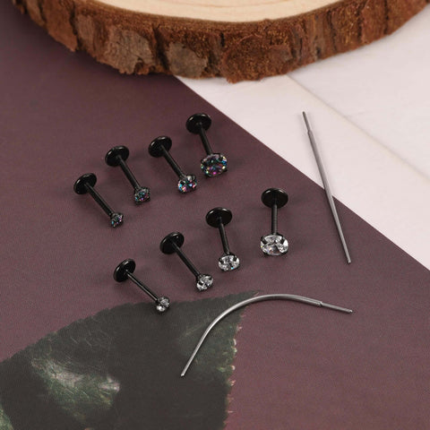 Black Threadless Nose Stud Set 18G And 20G Hypoallergenic Nostrial Tragus Lip Medusa Cartilage Helix Conch Piercing Jewelry on display