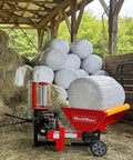Hay Baler And Wrapper Combo HB3120 HW20 for farms in barn with wrapped round bales, featuring hydraulic bale ejection.