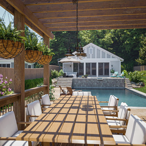 Broadcast 3 Light Outdoor Chandelier in oil rubbed bronze over rustic patio with wooden table and pool view
