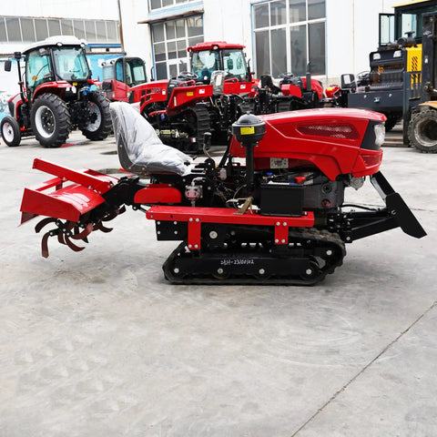 Side view of Small Farm Workhorse Mini Tracked Tractor with rubber tracks, red color, for easy operation in orchards and vineyards.