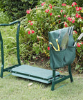 Two In One Garden Kneeler And Seat For Easy Weeding Flip Over Stool with tool pouch, supports 250lbs, set in garden.