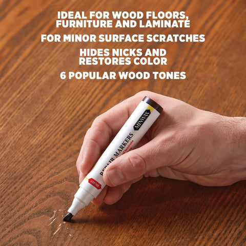Slick No Fuss Scratch Repair Marker For Hardwood Floors And Furniture Hide Deep Nicks Scrapes On Cabinets Laminate Door Trim Restore That Like New Look With Simple Glide Application Total Weekend Warrior Pick, hand using marker on wood.