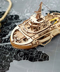 Rubber Band Powered Tugboat Model Kit 3D Wooden DIY Self Assembly Brainteaser With Mechanical Gears And Pendulum Motion For Curious Builders And Creative DIY Enthusiasts, wooden tugboat on map background