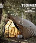 Hammock Hot Tent With Stove Jack For Winter Camping in wooded area, showcasing tent entrance and stove jack pipe.