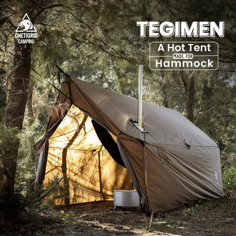 Hammock Hot Tent With Stove Jack For Winter Camping in wooded area, showcasing tent entrance and stove jack pipe.