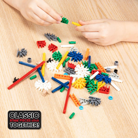 Roller Coaster Building Set With 546 Pieces And Motor Hands On STEM Toy For Ages 8 Plus Creative Building Kit For Solo Or Team Play Includes Ramp And Half Pipe Models, colorful K'NEX pieces on table