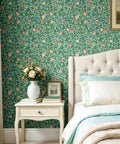 Hassle Free Peel And Stick Wallpaper Featuring Vintage Botanical Bird Graphics And Teal Green Pomegranate Vibes adorning a bedroom wall.