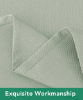 Close-up of 54x54 Inch Sage Square Tablecloth, linen-like texture, water resistant and washable, ideal for various sized tables.