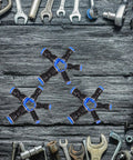 Get The Ultimate Air Hose Fittings Kit With 50 Pieces Of Quick Connect Pneumatic Push to Connect Adapters In Copper And Abs For Air Compressors In 4mm To 12mm Sizes That Are Built Tough For Auto Work And Heavy Duty Jobs All Season Long black push-to-connect fittings on workbench